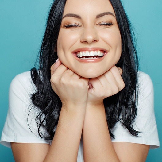 Woman sharing smile after teeth whitening