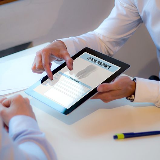 Dental insurance forms on tablet computer