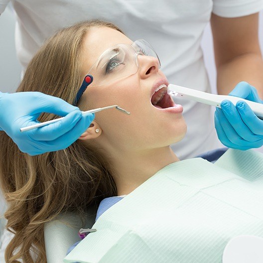 Dentist capturing intraoral images