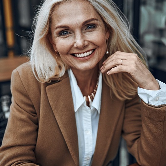 Woman smiling with veneers in Arlington