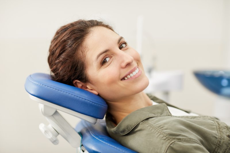 patient smiling during dental checkup in Arlington 